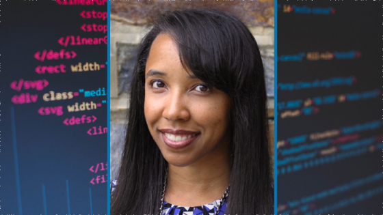 A smiling woman's headshot in front of a computer coding background 
