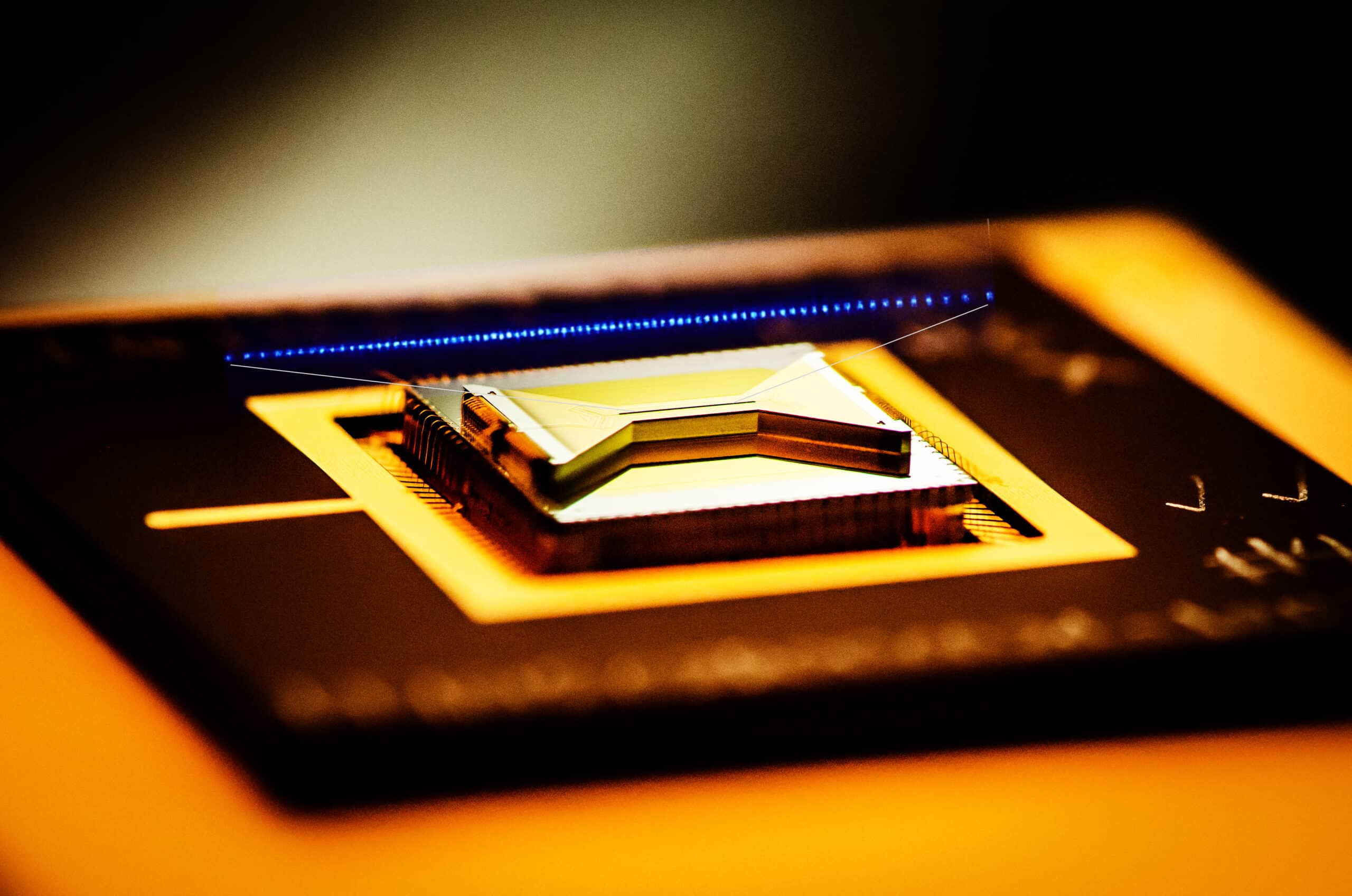 closeup view of a surface ion trap used in the quantum computing from Ken Brown and Jungsang Kim labs