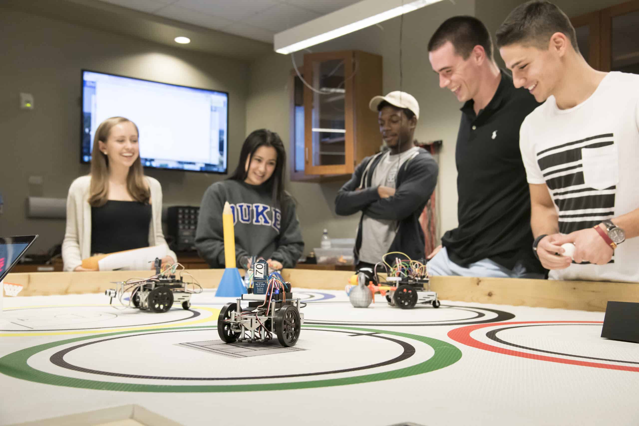 group of students competing in robot olympics