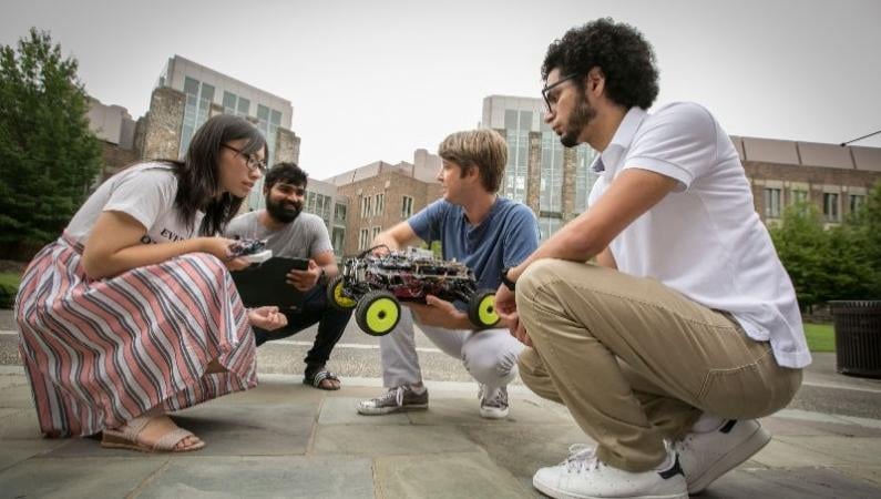 Mahmoud Elfar (right) with members of the Duke Cyber-physical Systems Lab