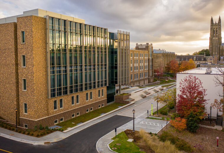 Exterior of Wilkinson Building with Duke Chapel in background